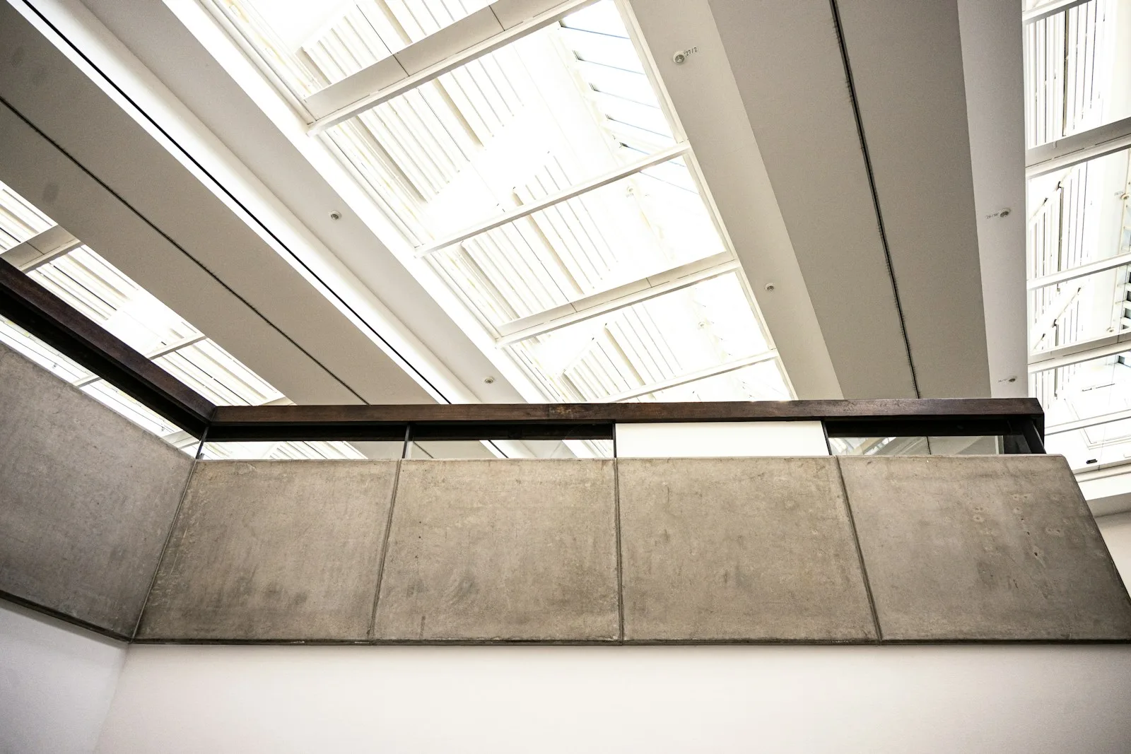 Sunlight across concrete and glass, an illustrative study of material and architectural detail